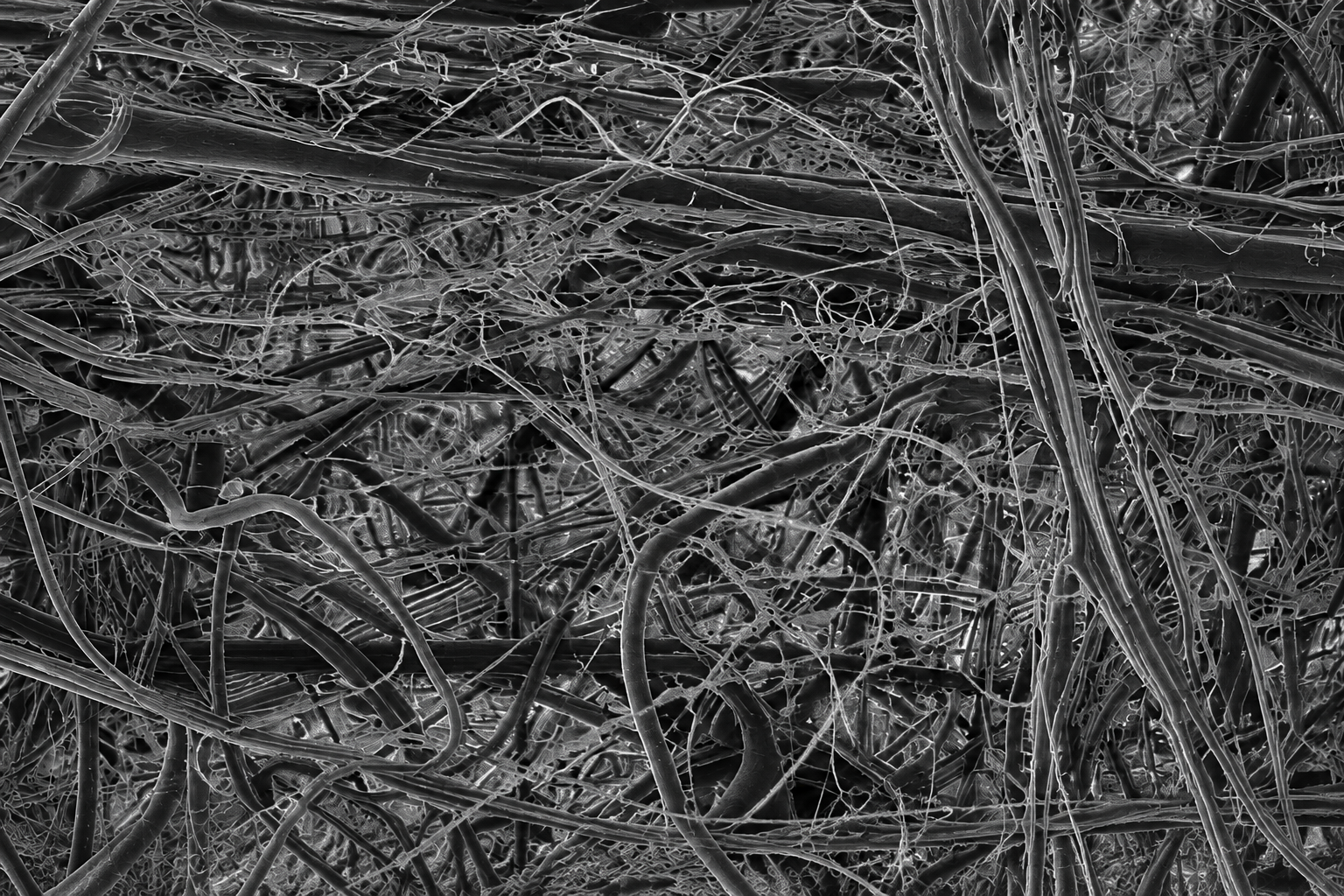 Conceptual hydraulic filtration media structure illustrating NANOFORCE fluid-cleanliness architecture